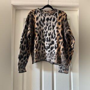 Cheetah sweater perfect for the spring. Open bottom w side slits. Cozy Sz S&M